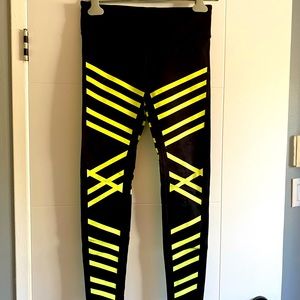 Alo leggings with reflective stripes